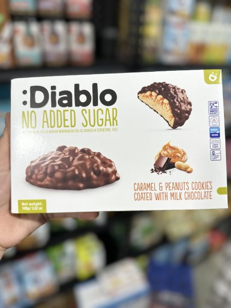 كوكيز ديابلو مغطى بالشوكولاتة بحشوه الكراميل والفول السوداني بدون سكر 100غم